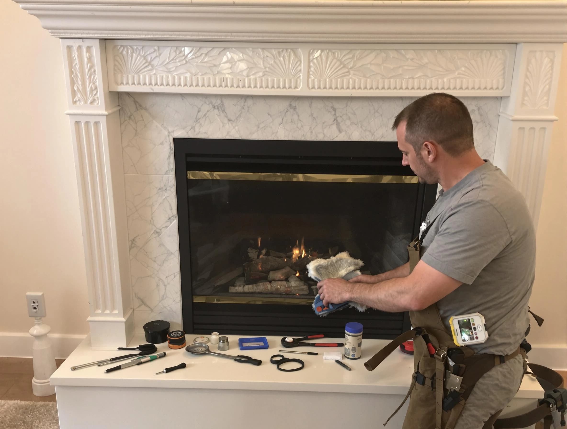 Youngtown Chimney Sweep performing fireplace maintenance in Youngtown, AZ